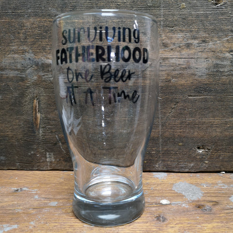 'Surviving Fatherhood, One Beer at a Time' Pint Glass